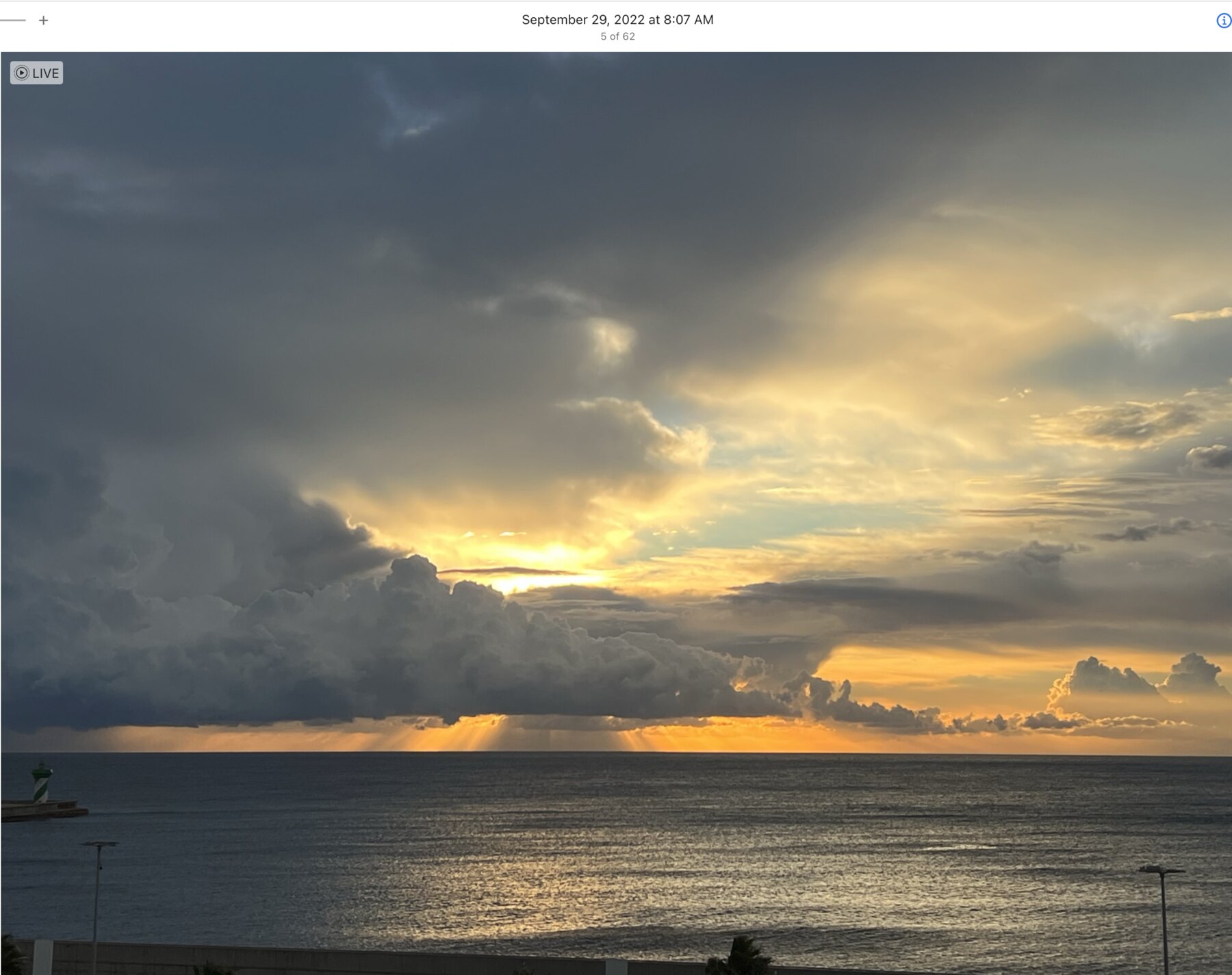 Golden break in storm clouds over the Mediterranean